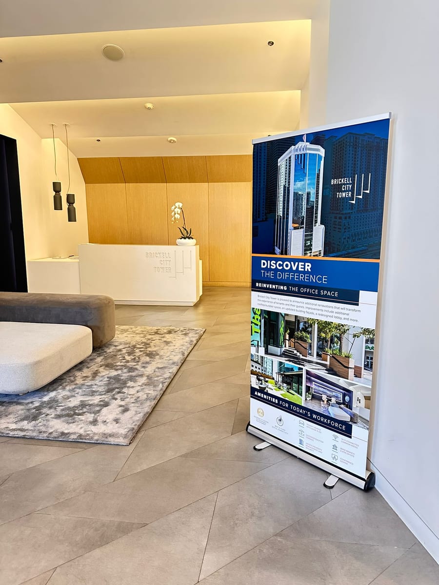 Reception desk in the Brickell City Tower lobby